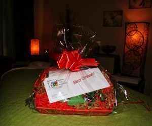 The Gift Basket - $125.00 ($155.00 value) Gift certificate for a 90 Minute Therapeutic Massage & Mother Earth Trigger Point Pillow.