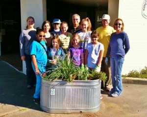 Girl Scouts helped KCB plant planters 