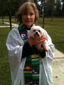 Bonnie Poirier, ordained minister for the Ministry of St. Francis of Assisi, during a pet blessing