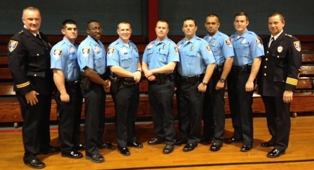From Left to right - Dy. Chief Doug Arrowood, Officer John Dupy, Officer Lance Benjamin, Officer Brian Pereira, Officer Bret Miller, Officer Timothy McJunkin, Officer Mark Dugas, Officer Brandon Crain and Chief of Police Tim Lentz.  Brian Pereira, Mark Dugas and Lance Benjamin brought home awards from the POST Academy representing top academic achievement, marksmanship and fitness, respectively. 